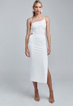 White fitted midi dress with one-shoulder design, gathered fabric, side cut-out detail, and thigh-high slit, crafted from smooth material.
