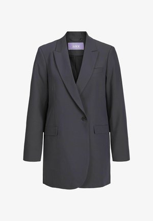 Mørk grå oversized blazer med spidse flapper, enkelt knaplukning, to forlommer og en glat stofstruktur. Brandetiket synlig indeni.