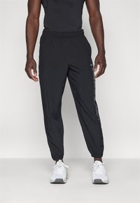 Nike Performance FORM PANT - Pantalones deportivos - black/metallic silver