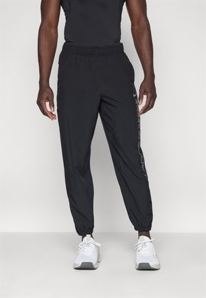 FORM PANT - Pantaloni sportivi - black/metallic silver