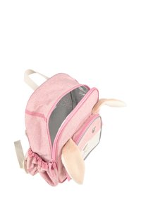 Small pink children's backpack with bunny face and ears, open main compartment, and adjustable cream straps.