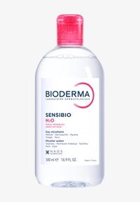 Klare Plastikflasche mit Mizellenwasser und pinkem Deckel, beschriftet mit "Bioderma Sensibio H2O", 500 ml, mit minimalistischem Design und Text.
