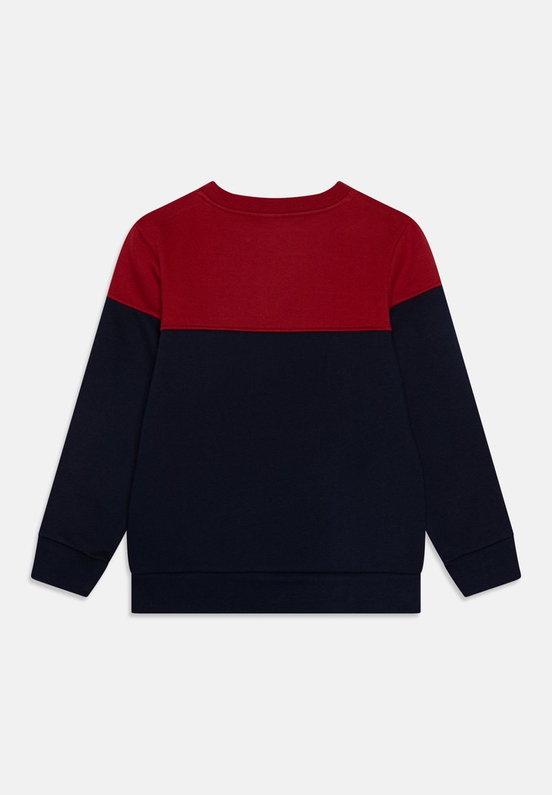Sweatshirt rouge et bleu marine à manches longues, design coloré, col rond, en coton doux avec des poignets et un ourlet côtelés.