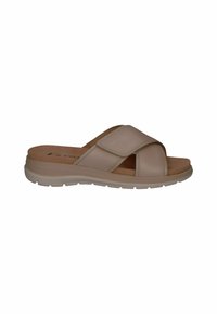 Beige slide sandal made of smooth leather, featuring crisscross straps, a Velcro closure, and a cushioned sole with a textured tread.