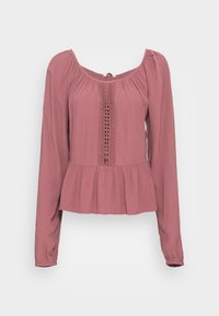 Langærmet bluse i rosefarve med tekstureret stof, peplumnederdel og lodret blonde detaljering foran. Rund halsudskæring og tætsiddende ærmer.
