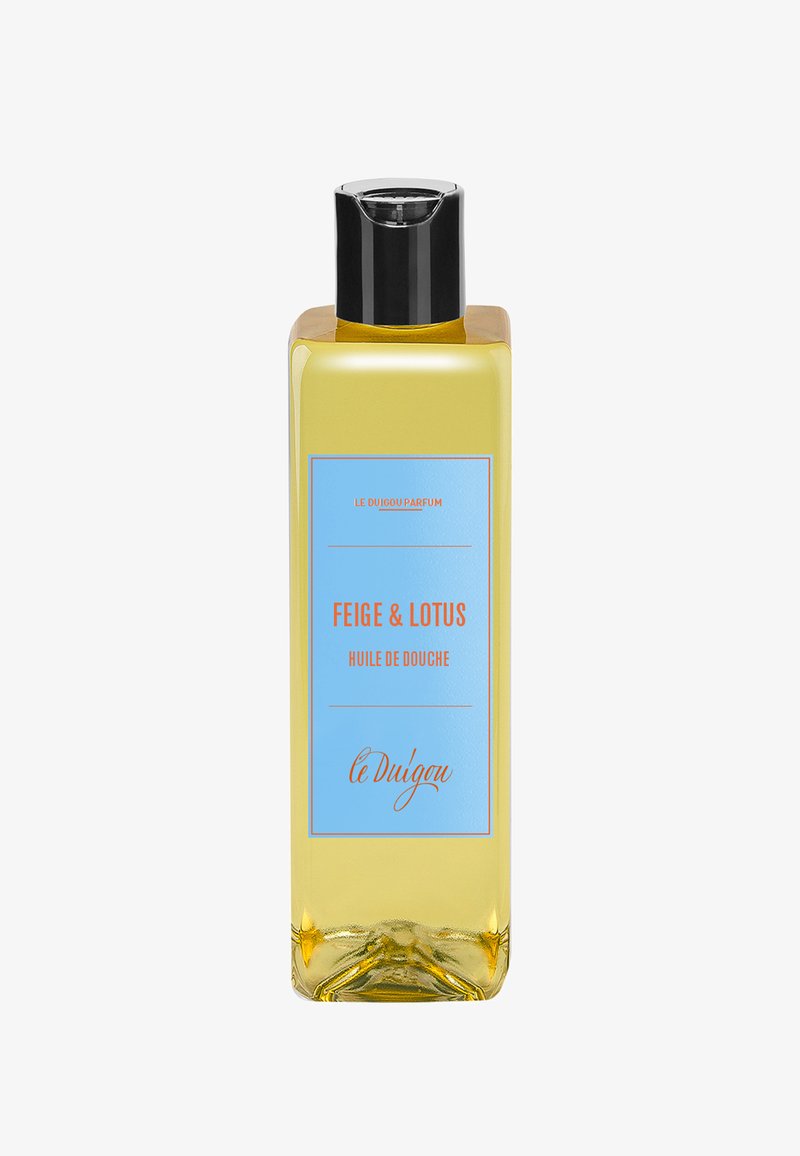 Transparente Flasche enthält gelbes Duschöl. Verfügt über ein blaues Etikett mit orangefarbenem Text und der Marke "le Duigou", minimalistisches Design mit einem schwarzen Deckel.