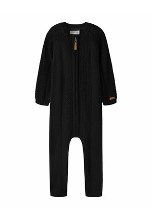 Grenouillère noire en maille tricotée, à manches longues, avec une fermeture éclair frontale et un motif câble texturé.