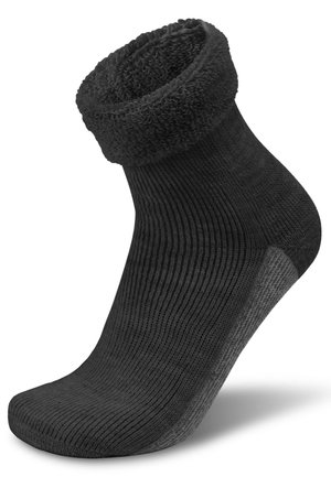 Schwarze Knöchelsocke mit einem strukturierten, gerippten Körper und einem flauschigen, umgeschlagenen oberen Teil. Verfügt über eine verstärkte Ferse und Zehen für zusätzliche Langlebigkeit.
