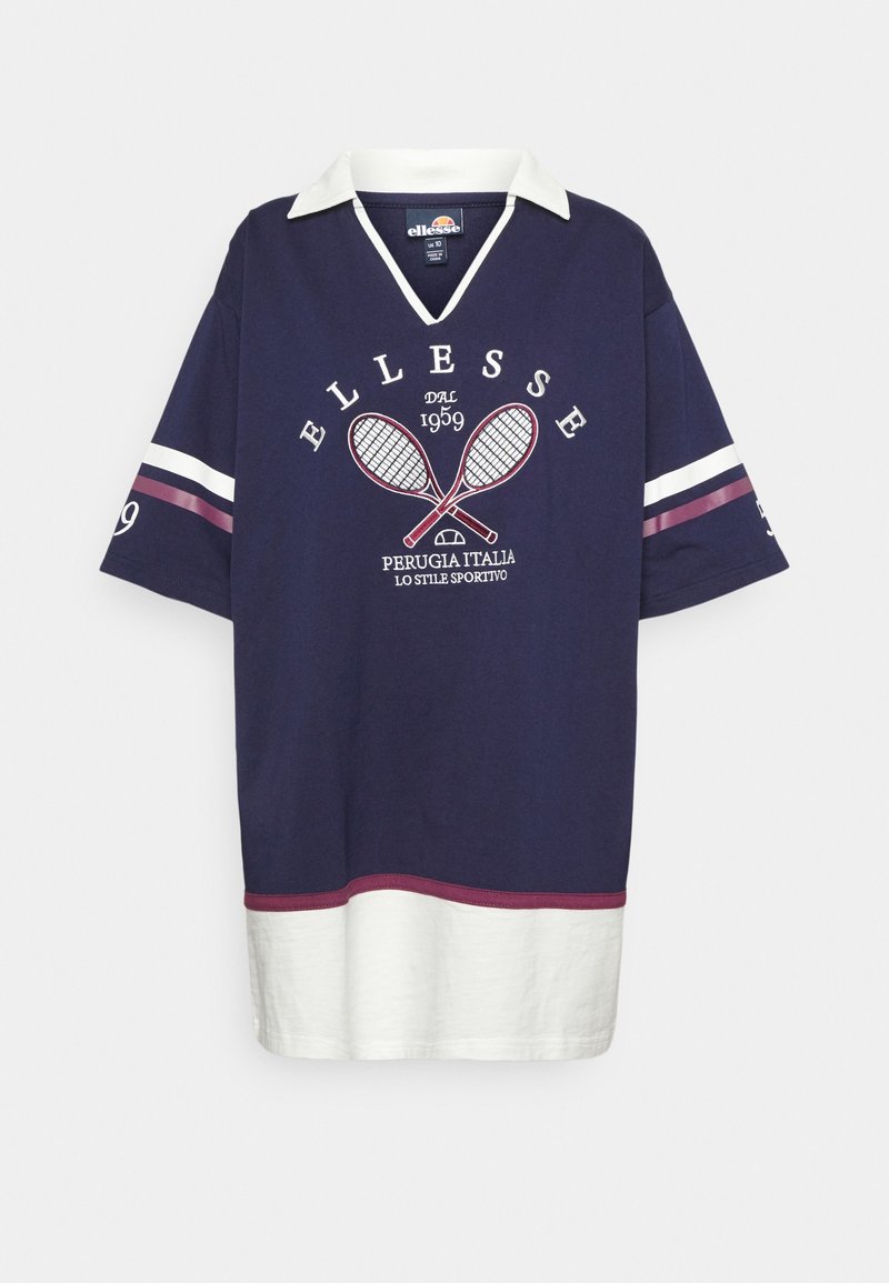 Polo manches courtes bleu marine et blanc avec motif raquette de tennis, col blanc, et texte "Ellesse Perugia Italia Lo Stile Sportivo."