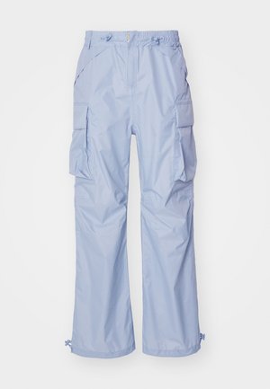 Light blue cargo pants made of water-resistant material, featuring a relaxed fit, multiple side pockets, and adjustable cuffs.
