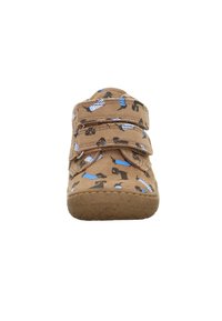 Brown fabric shoe with two Velcro straps, featuring a dog pattern in black and blue. Rounded toe and textured sole for grip.