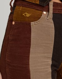 Corduroy broek met verticale strepen in bruin, beige en zwart. Inclusief een gestikt logo en koperkleurige hardware-accenten.