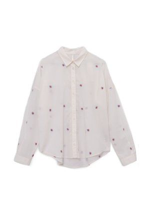 Chemise blanche à boutons, en tissu léger, dotée d'un col et d'une broderie florale dans des tons de bleu et de rouge répartie sur l'ensemble.