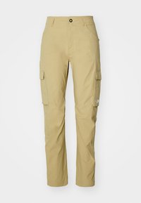 Beiga cargobyxor med rak ben design, två sidofickor och en cargoficka på låret med logodetalj nära fållen.