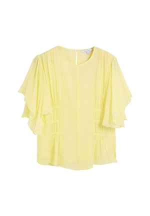 Blusa amarillo claro con mangas con vuelo, escote redondo, detalles fruncidos en la cintura y un pequeño cierre con botón en la parte trasera del cuello.