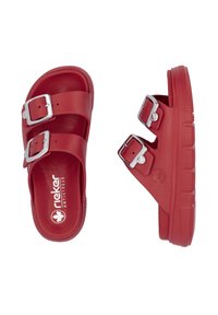 Red sandals made of textured material, featuring two adjustable silver buckles, a contoured footbed, and a rugged sole.