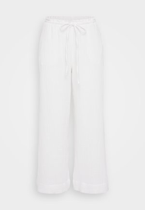 Witte, lichte, katoenen gaasbroek met een relaxed fit, elastische tailleband, trekdraadsluiting en wijde benen. Geverfd stofafwerking.