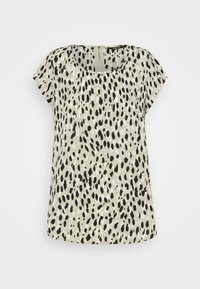 Blusa a maniche corte in tessuto verde chiaro con motivo a pois neri e bianchi. Caratterizzata da un collo rotondo e chiusura con zip sul retro.