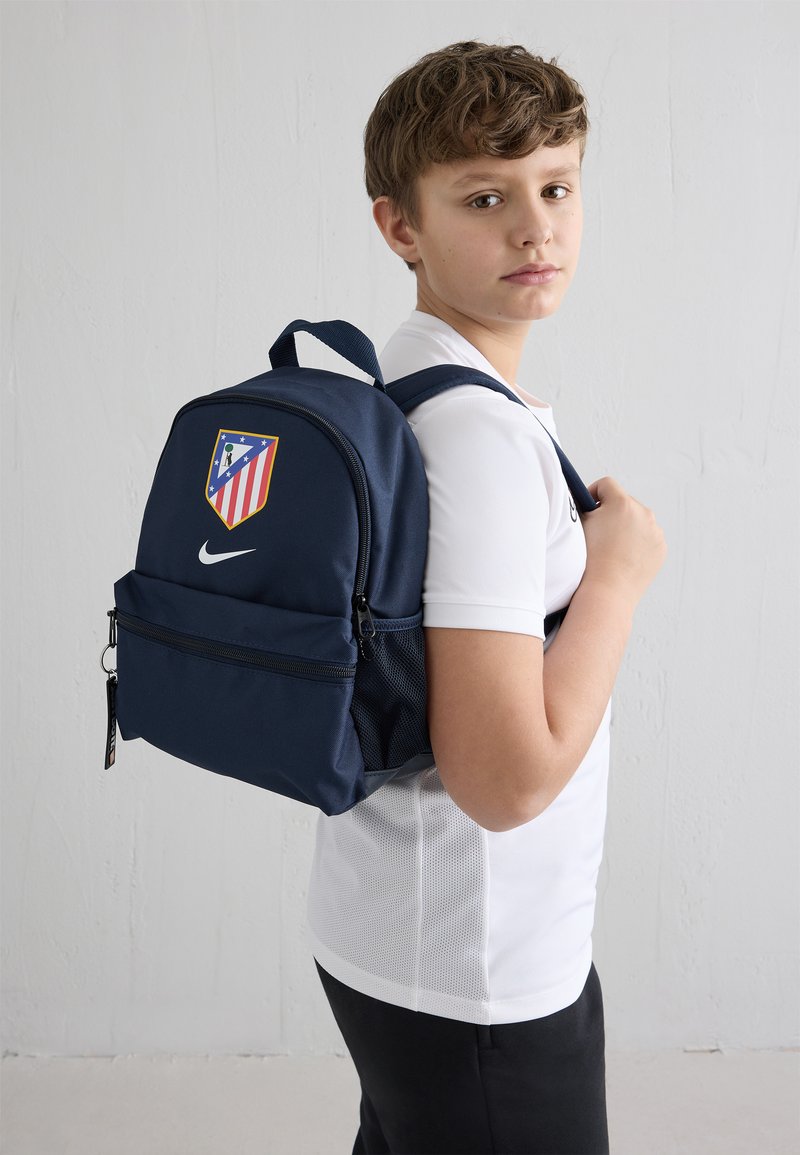 atletico madrid nike backpack Atlético Stadium Backpack, Black/Black/White, Standard Size Sports & Outdoors quality polyester with PVC linings Backpack Nike Atletico Madrid 25/26