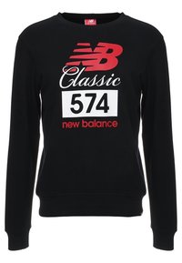 Felpa nera a maniche lunghe con scollo rotondo, con grafica bianca e rossa, "New Balance" e "574" sul davanti. Tessuto in morbito cotone.