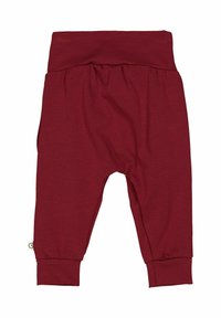 Red cotton baby pants with a wide, gathered waistband, elastic cuffs at the ankles, and a smooth texture. No patterns or graphic details.