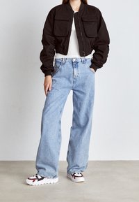 Tommy Jeans Džíny Relaxed Fit - light-blue denim