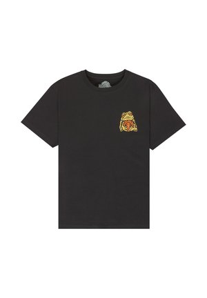 T-shirt nera a maniche corte con una piccola rana stilizzata gialla e arancione che tiene un oggetto circolare sul petto a sinistra.