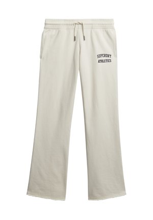 Pantaloni della tuta beige chiaro realizzati in misto cotone, con cintura regolabile, design a gamba larga e la scritta "SUPERDRY ATHLETICS" stampata in lettere scure.