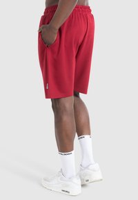 Smilodox NALE TRAINING SHORTS - Korte broeken - bordeaux
