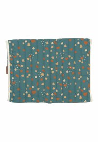Quilted fabric mat with a teal background, featuring irregular beige and rust-colored pebble patterns, finished with a white border.