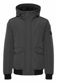 Gray padded jacket with a high collar and adjustable hood. Features two front pockets and ribbed cuffs for a snug fit.