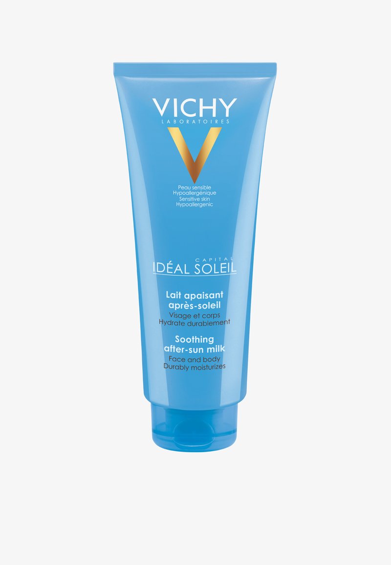 Blaues Plastikröhrchen mit Vichy After-Sun Milch, ausgestattet mit einem Klappdeckel. Das Etikett enthält in Weiß und Gold detaillierte Informationen zur Verwendung für Gesicht und Körper.