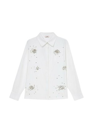 Witte lange mouwen shirt met een gestructureerde kraag, voorzien van zilveren versieringen in clusterpatronen op de voorkant. Glad stoftextuur.