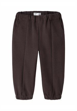 Pantalon de jogging marron foncé pour tout-petits avec taille et poignets élastiques, poches latérales et tissu légèrement froncé à la taille et aux chevilles.