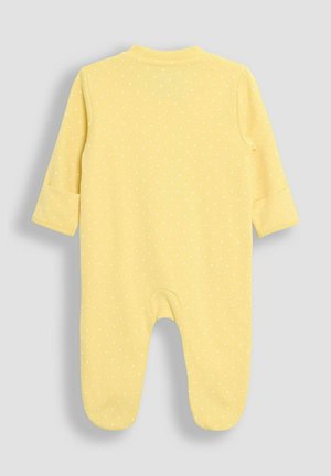 Mono de puntos amarillos hecho de algodón suave, con mangas largas, cuello redondo y diseño de pies para calidez y comodidad.