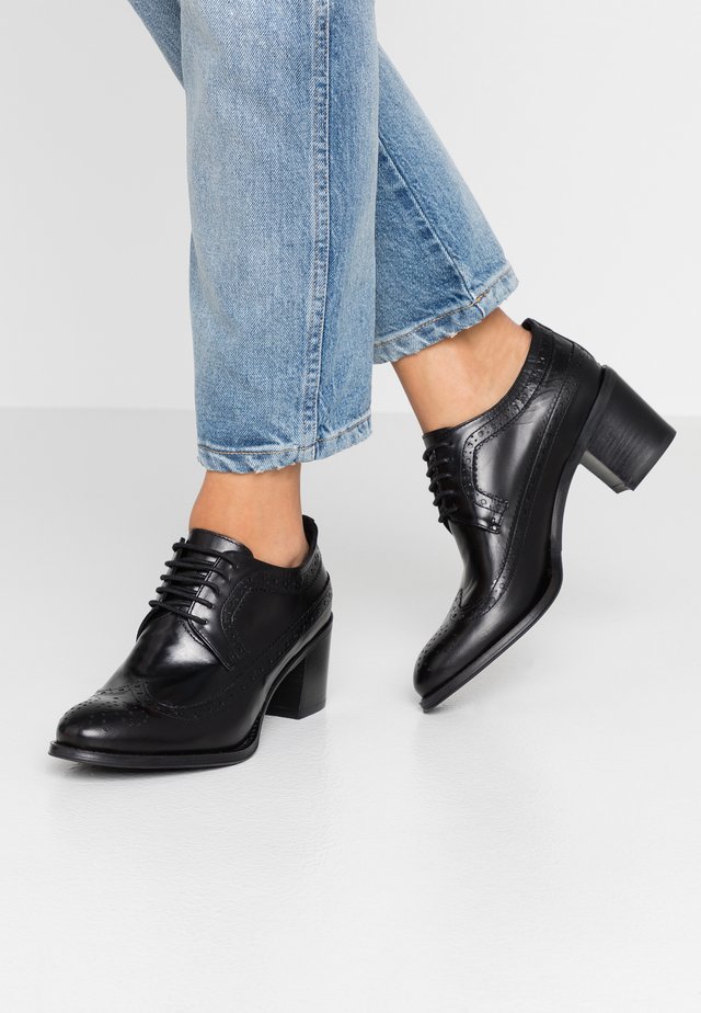 Ankle boots - nero