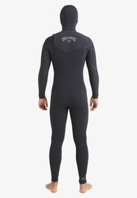 Black wetsuit with long sleeves and integrated hood. Features gray stitching and logo on back. Material appears smooth and stretchy.