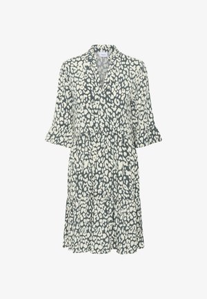 Knee-length šaty so vzorom zvieracej kožušiny v bielej a tmavozelenej farbe, s 3/4 rukávmi s volánmi, vrstvenou sukňou, V-výstrihom a voľným strihom.