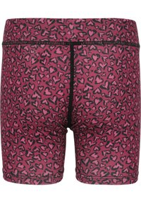 Vaaleanpunaiset bokserit, joissa on mustien sydänten kuvio, valmistettu pehmeästä kankaasta ja varustettu joustavyötäröllä sekä litteillä saumoilla.