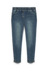 Pantaloni in denim con un lavaggio blu scuro, cintura elastica, tasche frontali e inserti decorativi a borchia all'orlo. Vestibilità slim e svasata.