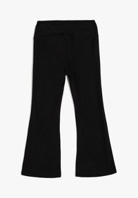 Czarne legginsy w kształcie dzwonów wykonane z miękkiej, elastycznej tkaniny. Oferują gładki pas w talii oraz dwie tylne kieszenie. Prosty i uniwersalny design.