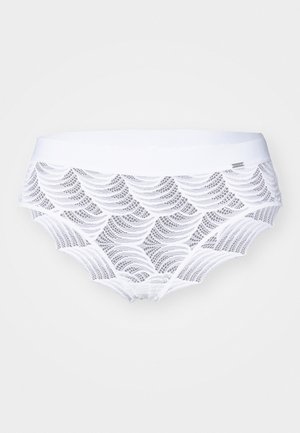 White lace boyshorts featuring a wave pattern, elastic waistband, and soft texture, designed for comfort and breathability.