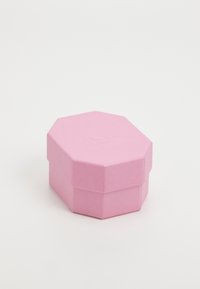 Octagonal pink box with a textured finish and embossed logo on the lid, featuring a secure closure and smooth edges.