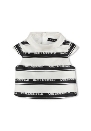 Top sans manches blanc et noir avec un col haut, présentant le texte répété "KARL LAGERFELD" en gras. Tissu lisse, légèrement texturé.