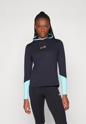 Long-sleeve athletic top in navy with an aqua hood. Features textured fabric and a small orange logo on the chest. Slim fit design.