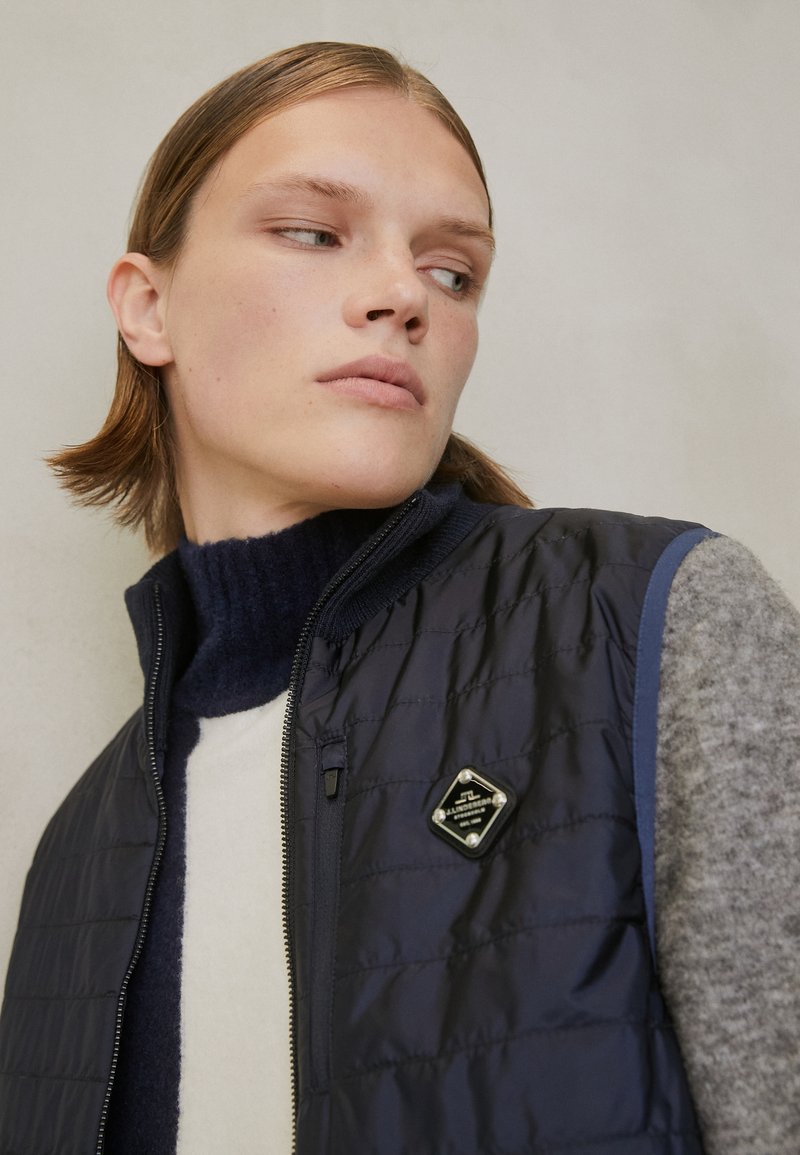 J.LINDEBERG HYBRID ZIP VEST Waistcoat navy/dark blue Zalando.co.uk