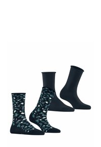 Trzy pary skarpetek: jedna para z ciemnym wzorem w turkusowe i białe kropki oraz dwie pary w jednolitym ciemnym kolorze.