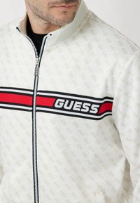 Guess ALLOVER LOGO - Sweatjakke - weiß