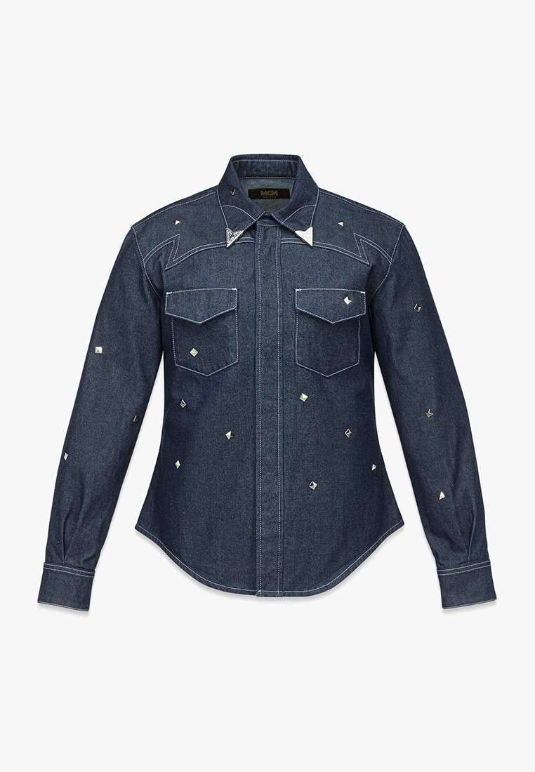 Koszula dżinsowa z dwiema kieszeniami z przodu, z napami i metalowymi zdobieniami w geometryczny wzór. Klasyczny kołnierzyk i długie rękawy.