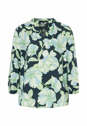 Navybluse mit großen weißen und hellblauen Blumenmustern, V-Ausschnitt, 3/4-Ärmeln und weicher, glatter Stoffstruktur.